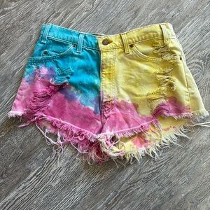 Vintage tie dye Levi’s 560 cutoff shorts